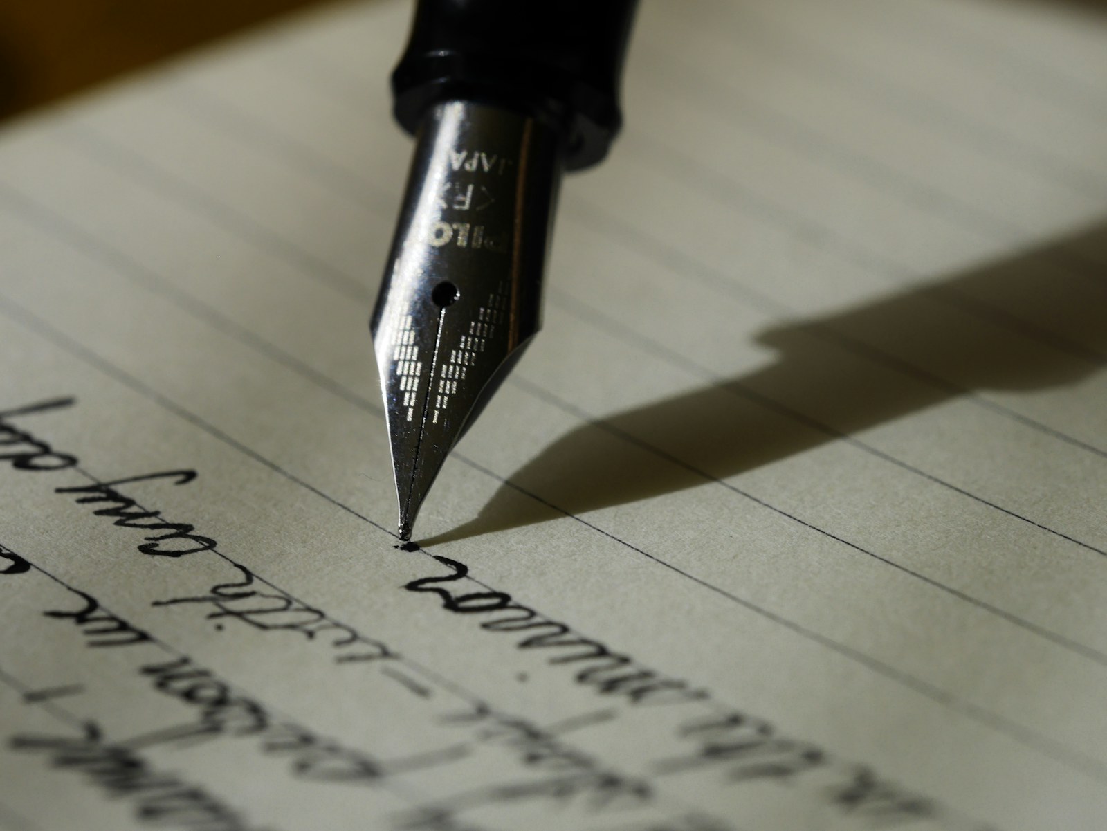 Notebook and writing materials on a desk