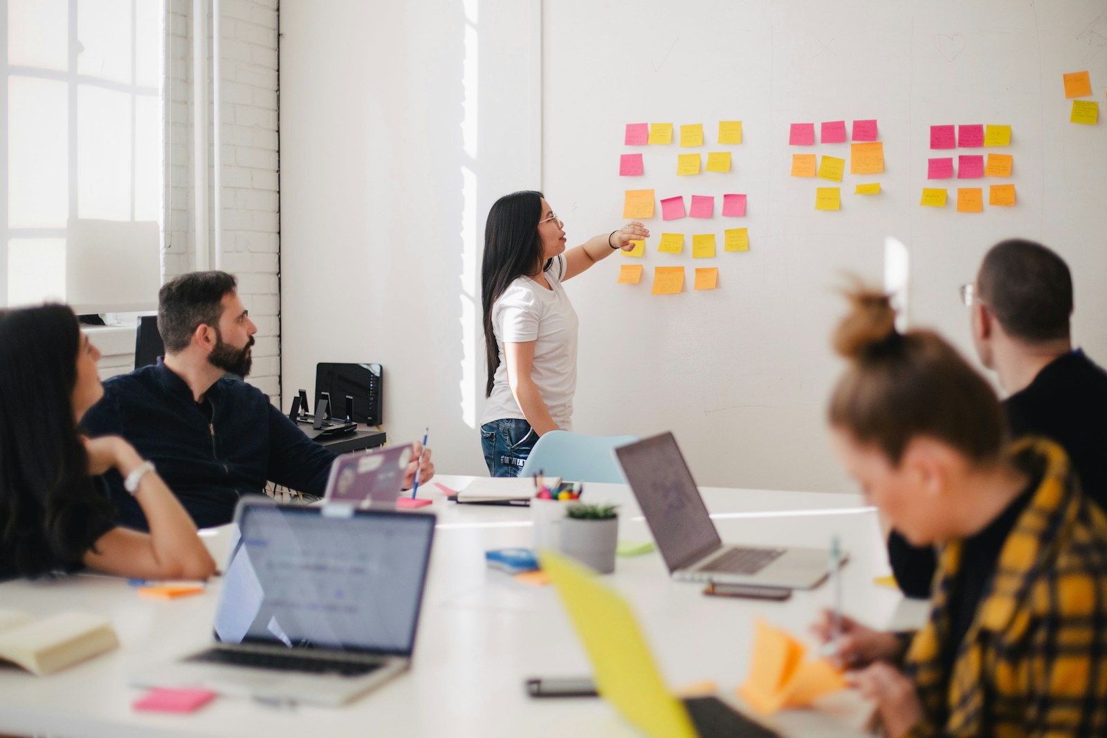 Colleagues working together in a workshop
